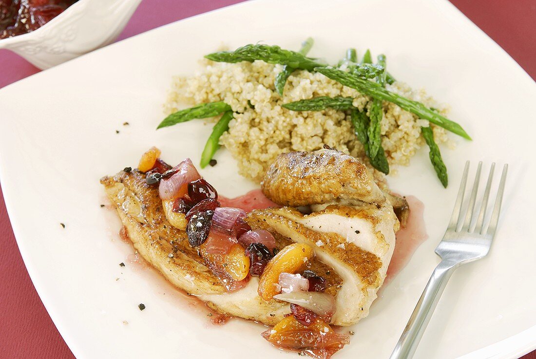 Roast chicken breast with peach and cranberry sauce