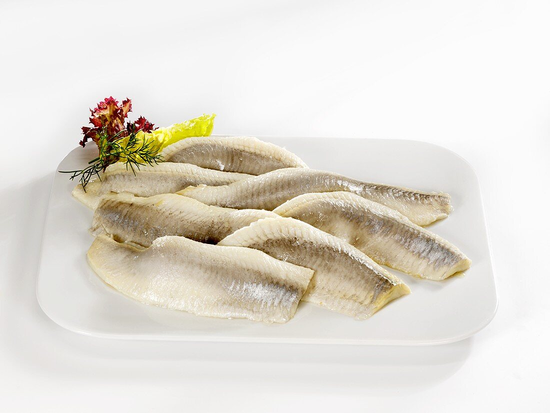 Matjes herring fillets on a platter