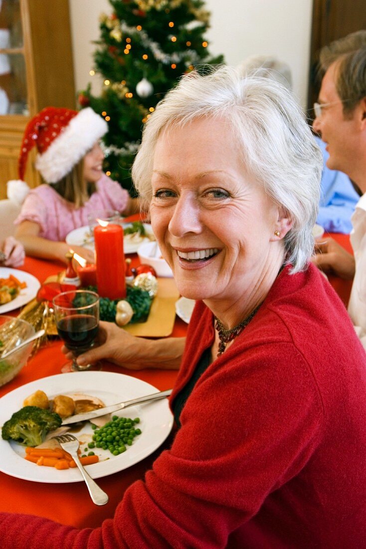 Grandmother at family Christmas dinner