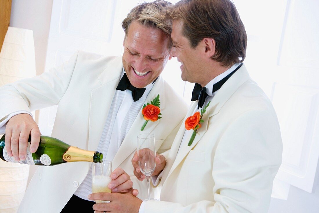 Same-sex, male couple celebrating wedding