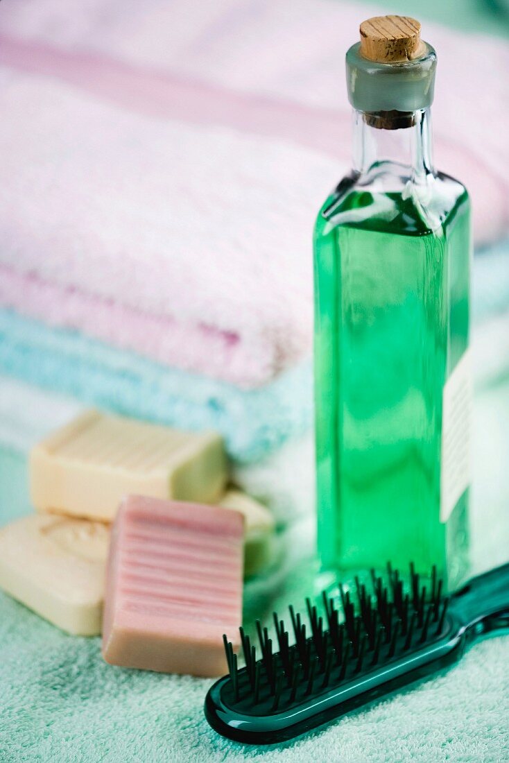 Toiletries: soaps, hairbrush and bath oil