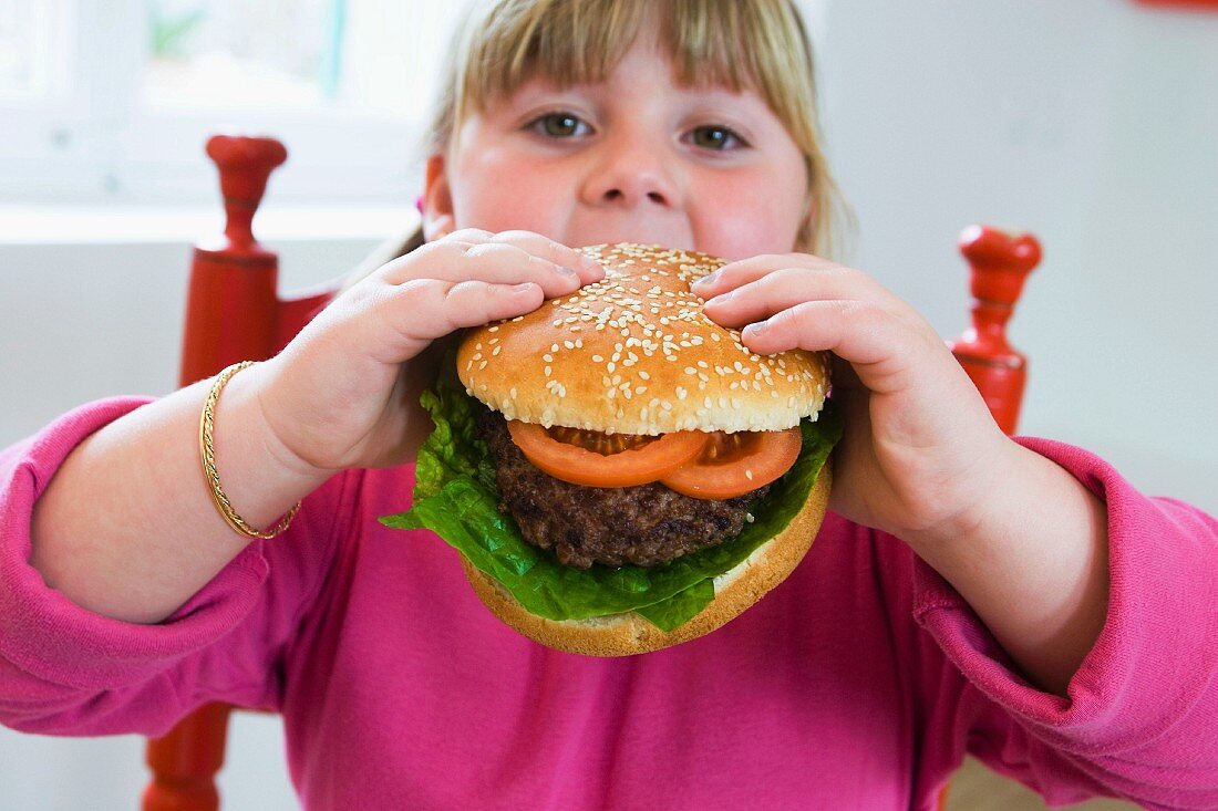 Girl with hamburger