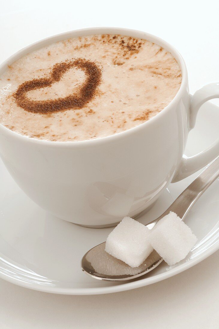 Cappuccino with heart shape in cocoa