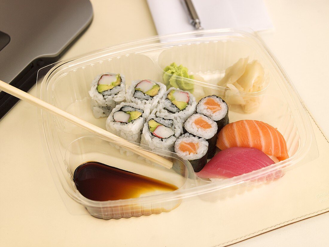 Sushi bento box on a desk