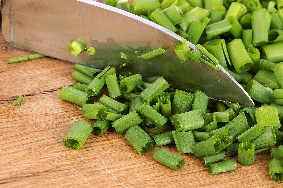 Chopped chives with knife