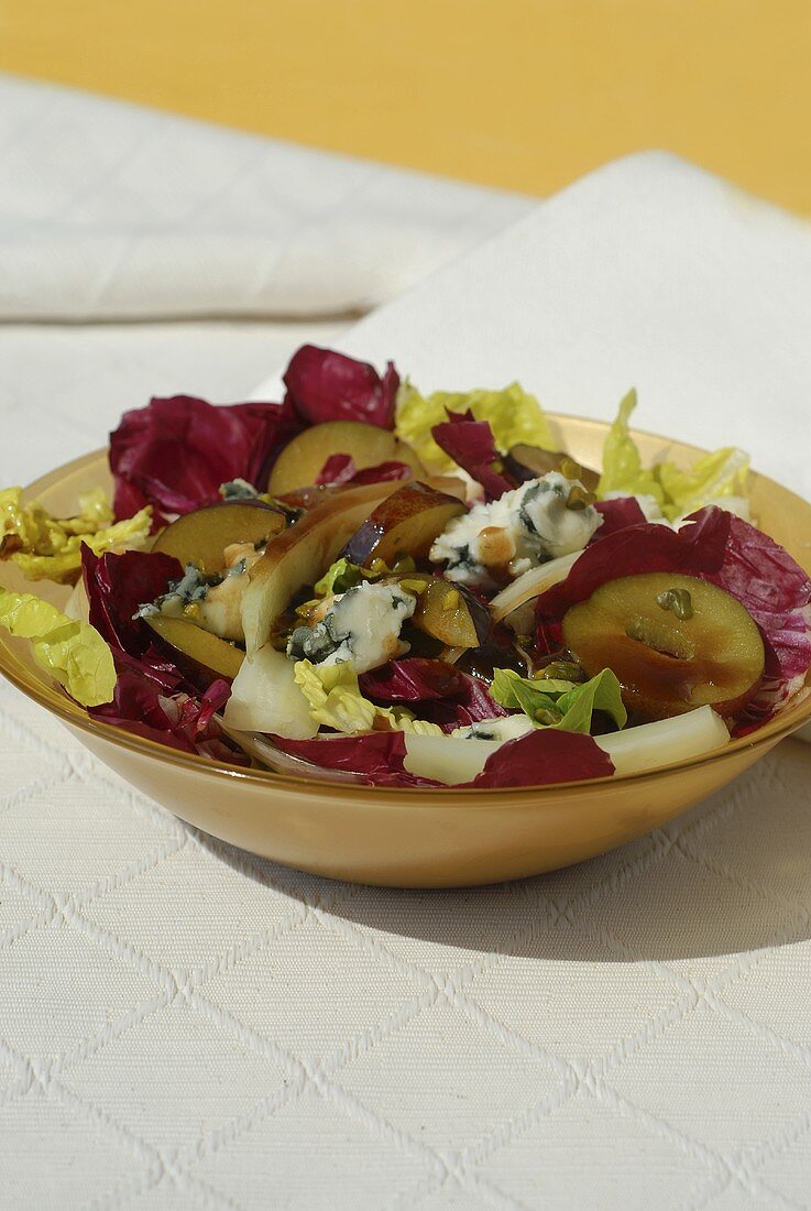 Plum and radicchio salad with Roquefort and mustard dressing