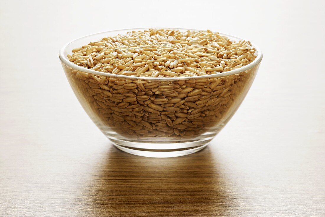 Oat grains in a glass bowl