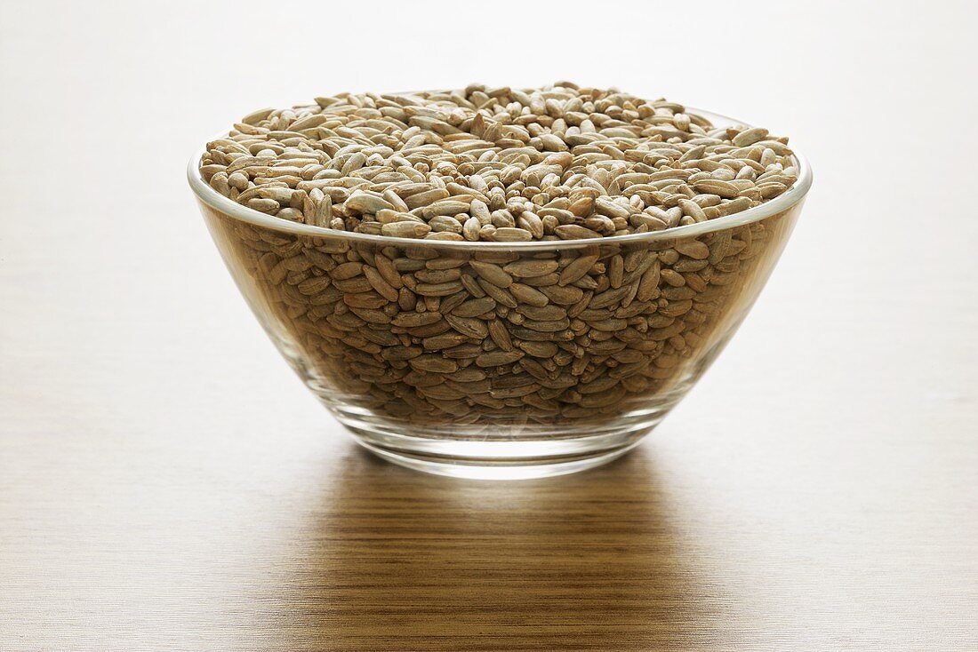 Grains of rye in a glass bowl