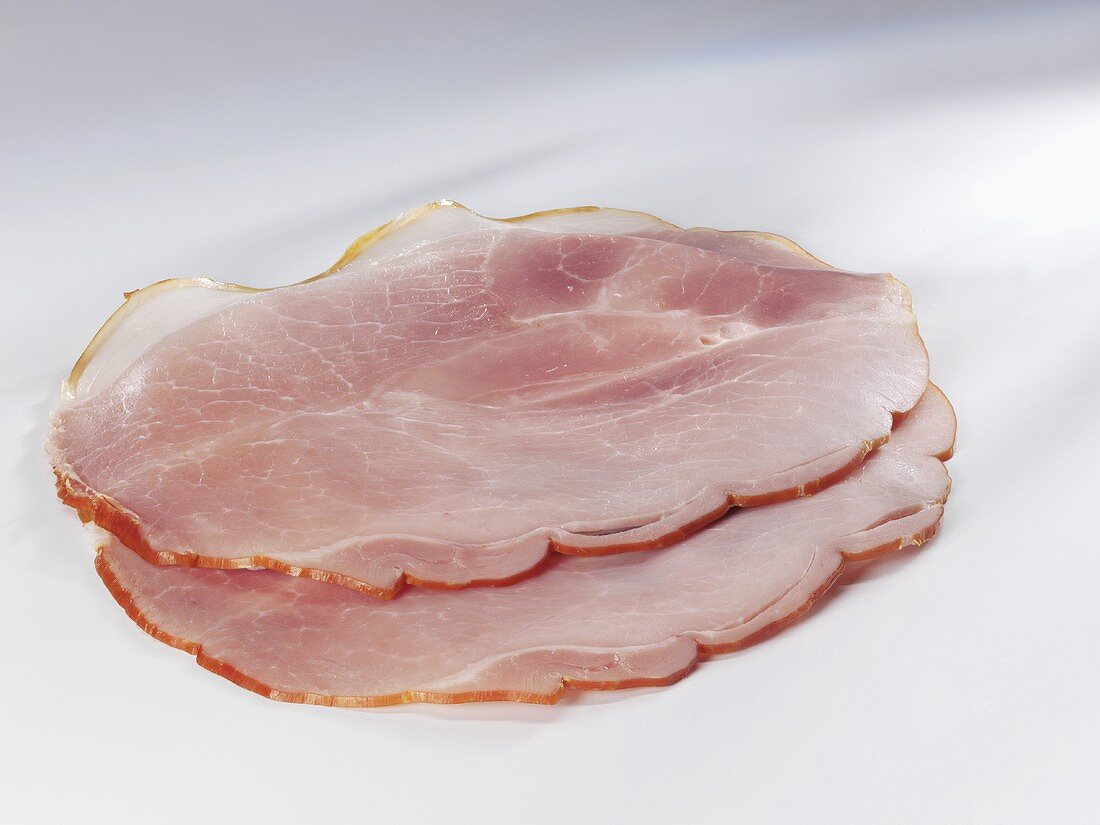 Two slices of cooked ham