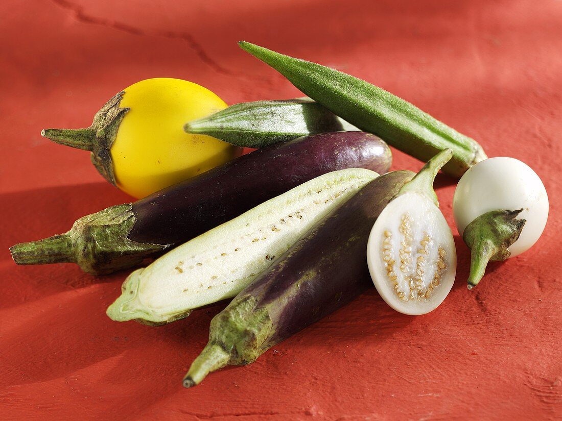 Various types of aubergines and okra pods