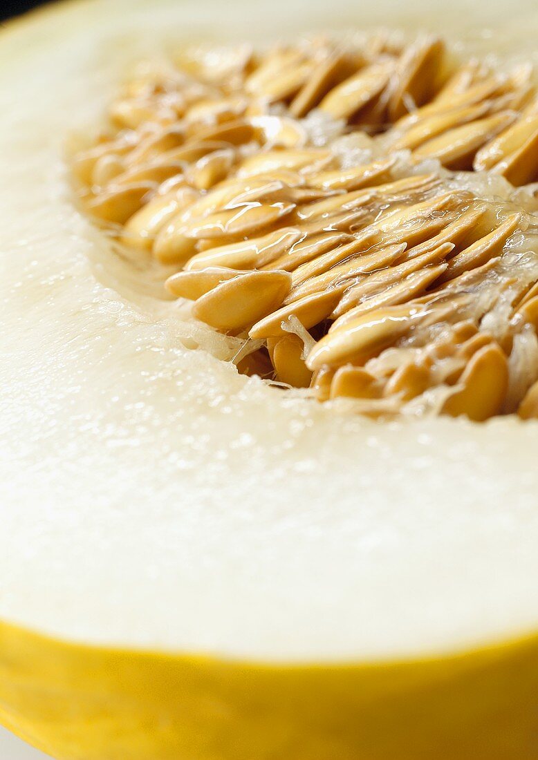 Half of a honeydew melon with seeds (detail)