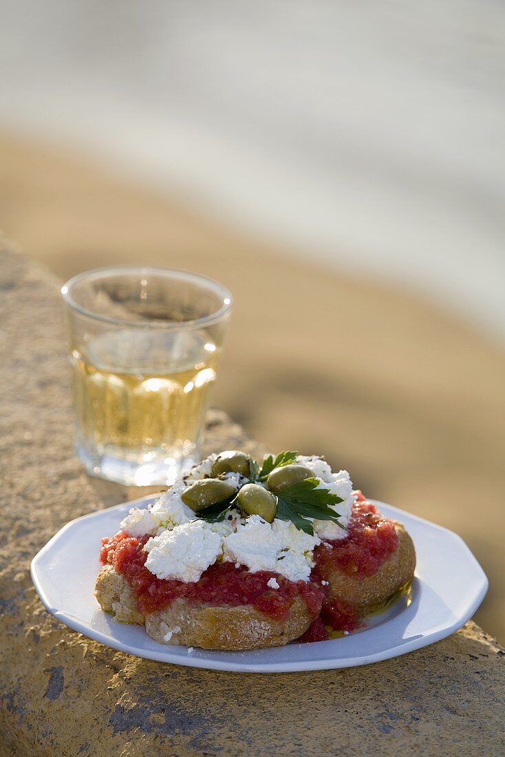 Dakos (Rusks with tomatoes and feta, Greece)