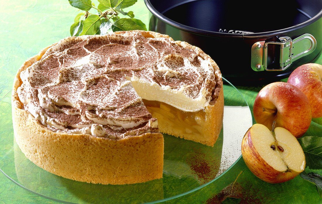 Apple cake with cream and cocoa powder