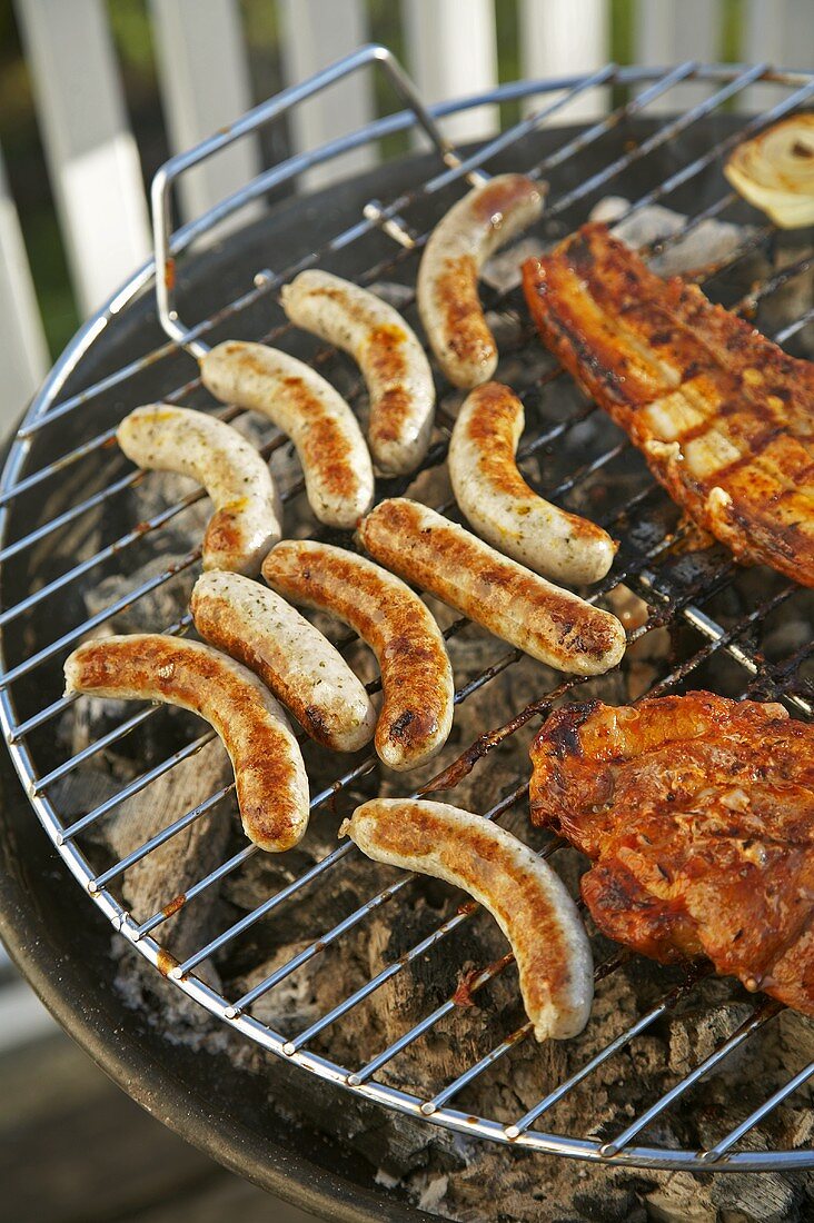 Sausages on barbecue