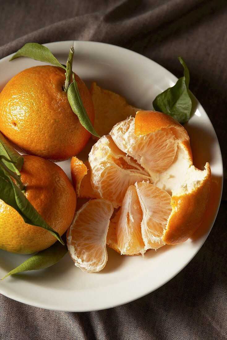 Mandarin oranges, one peeled