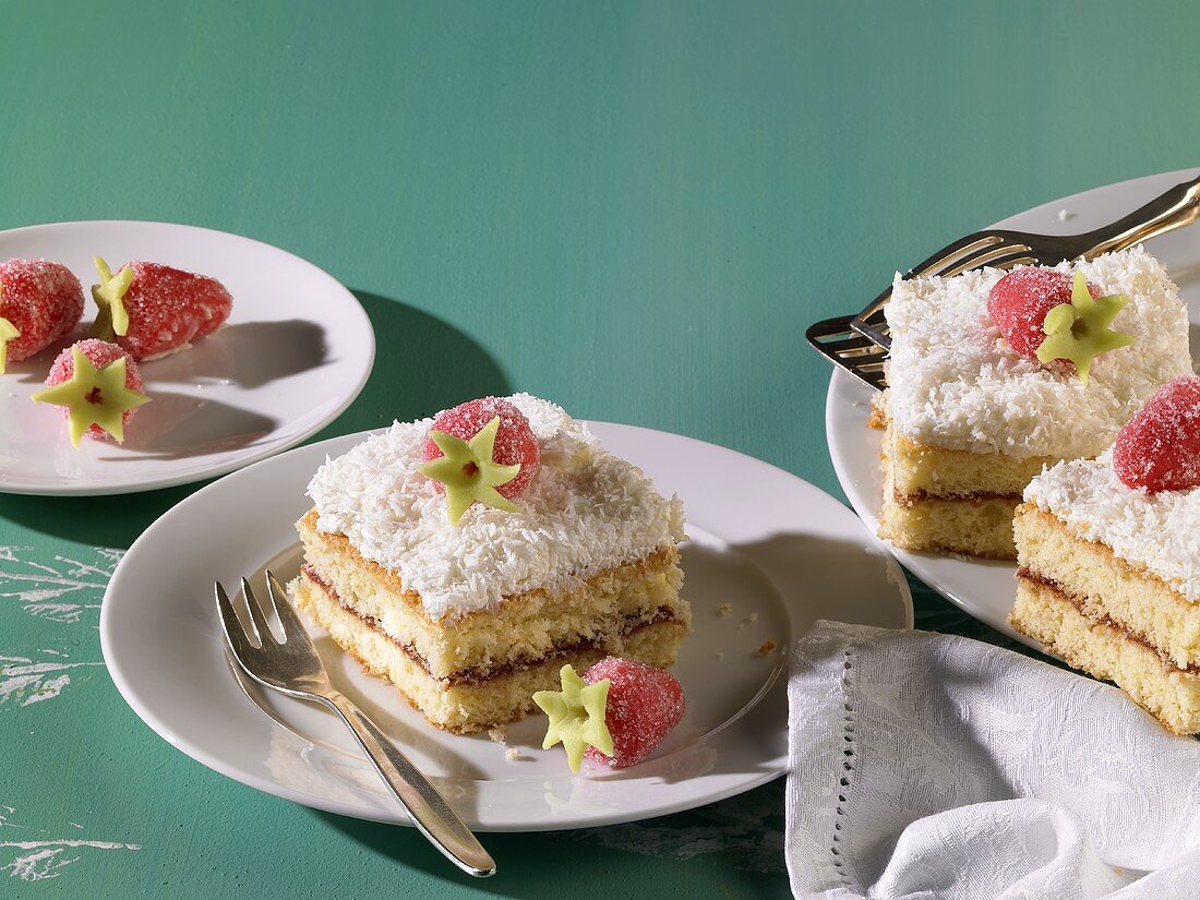 Coconut slices decorated with marzipan strawberries