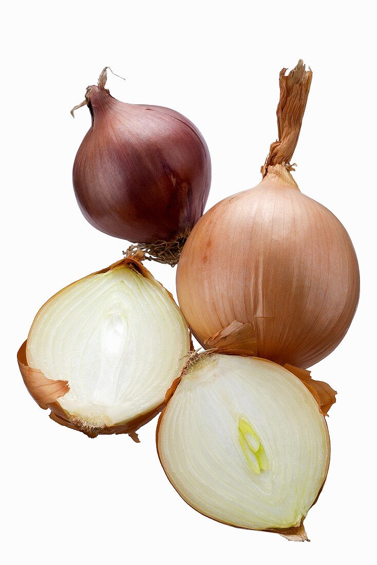 Onions, one cut in half