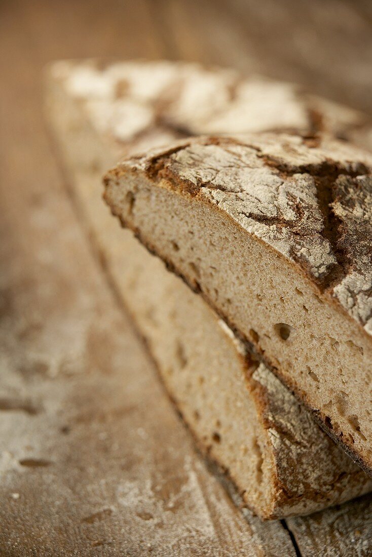 A halved loaf of rye bread