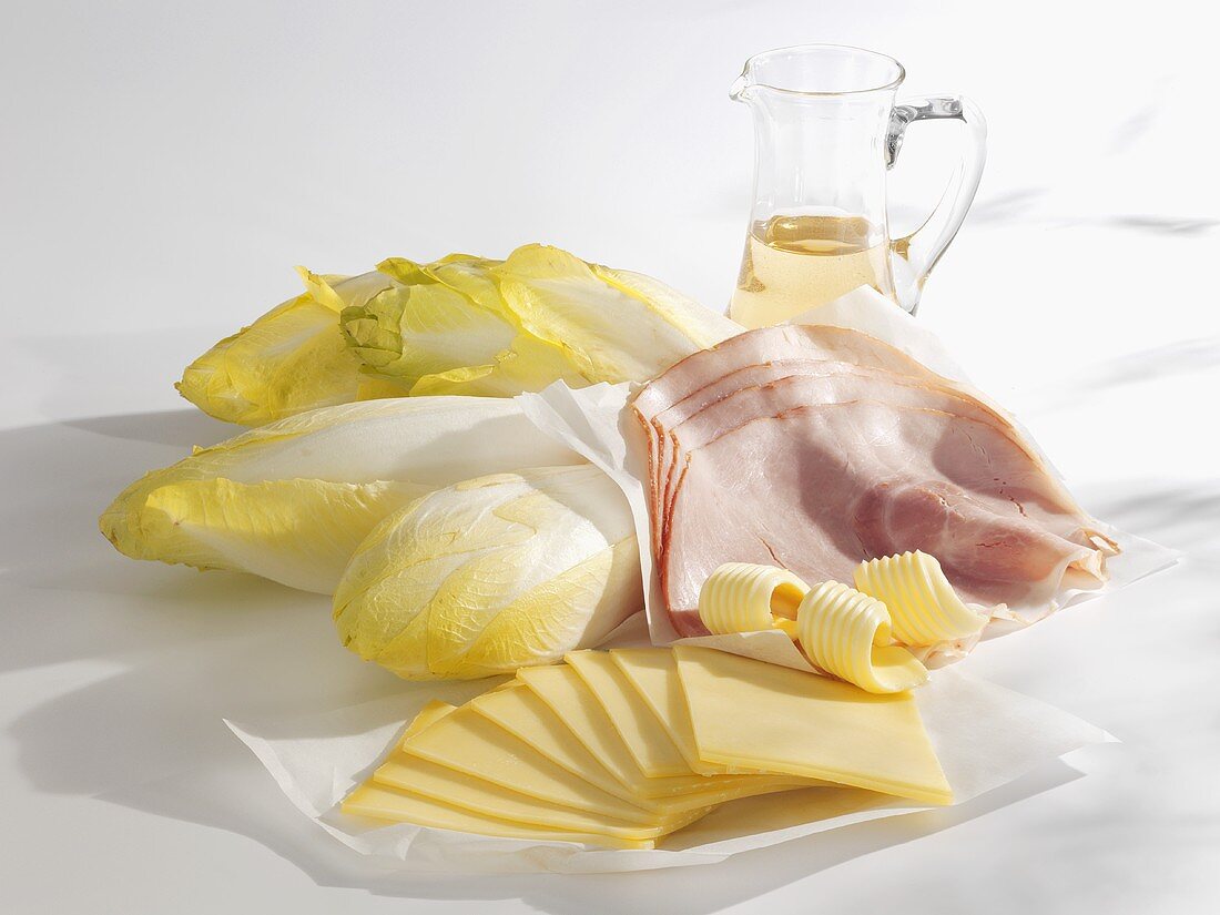 Ingredients for baked chicory with ham and cheese