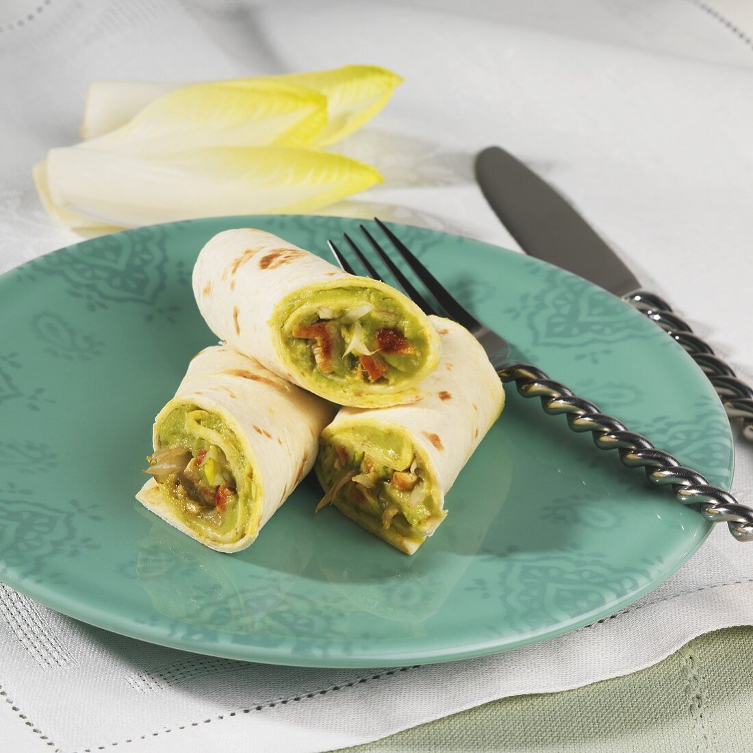 Wraps filled with avocado and chicory