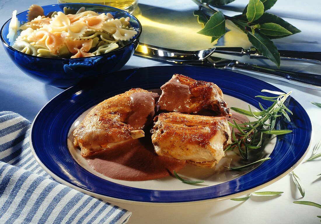 Rabbit on olive sauce with farfalle