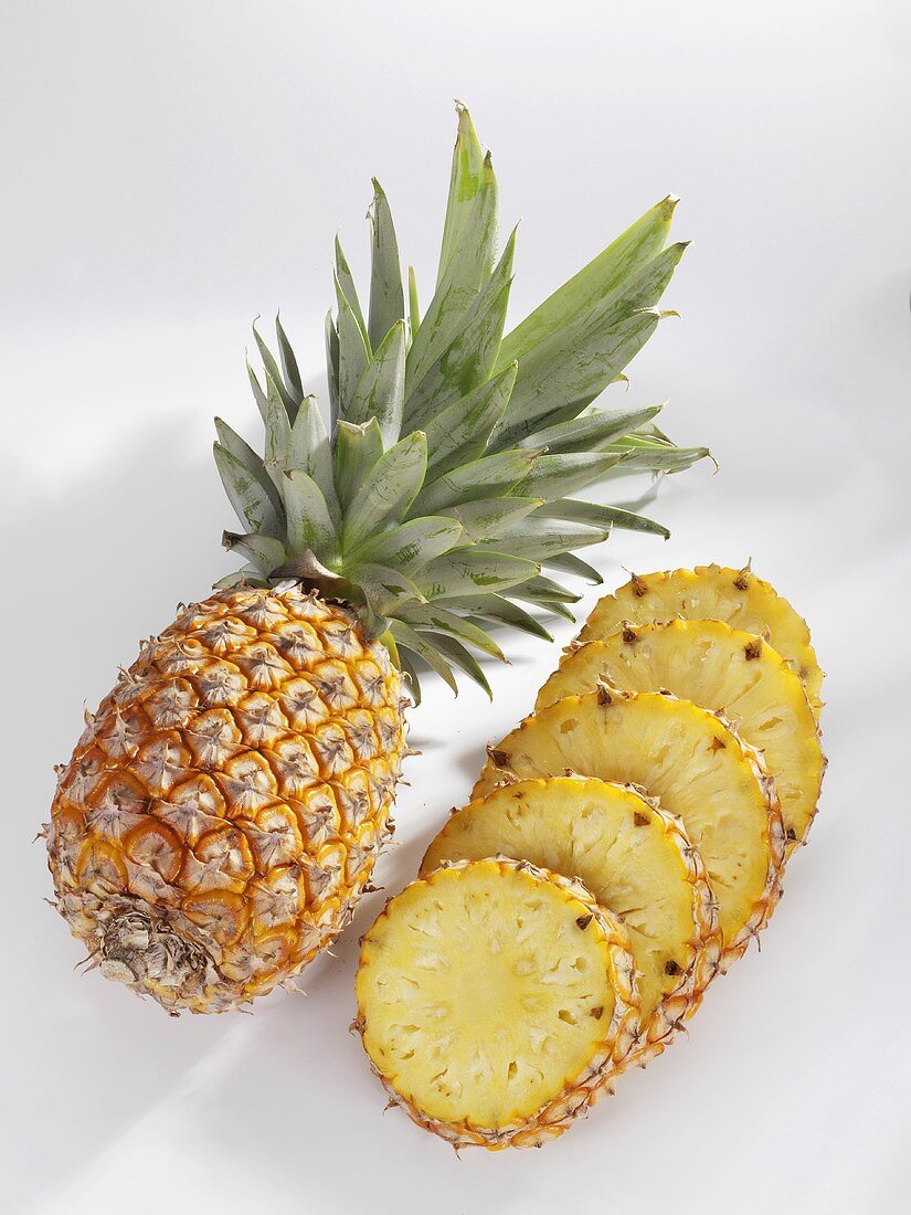 Pineapple, whole and sliced