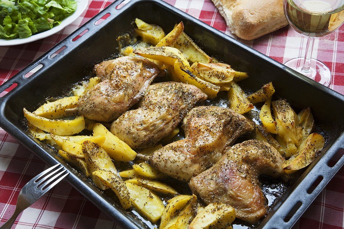 Oven-baked herb chicken and potatoes