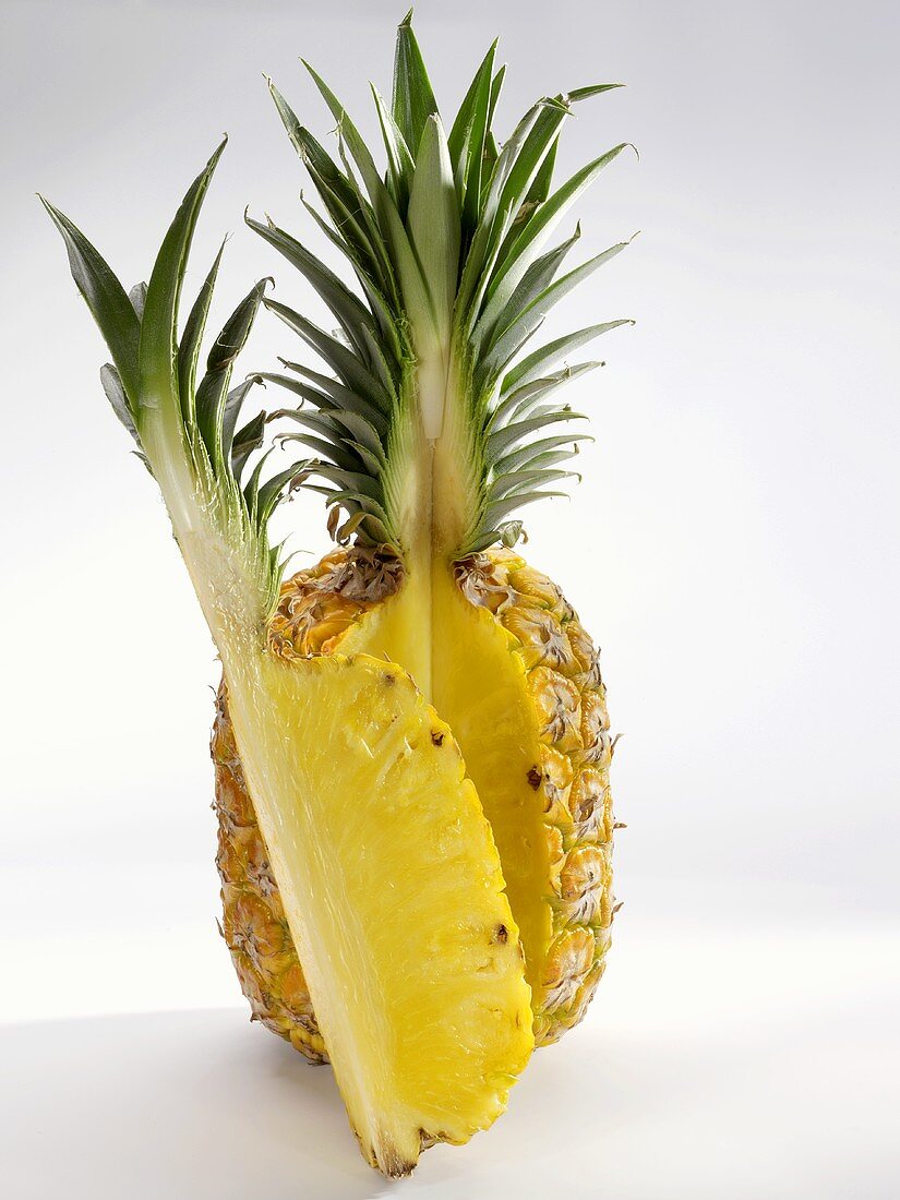 A pineapple showing a cut surface