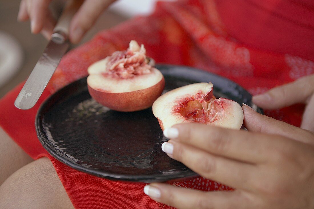 Cutting up a peach