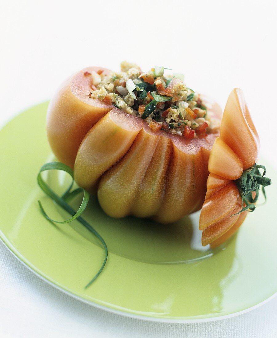 Beefsteak tomato with anchovy stuffing