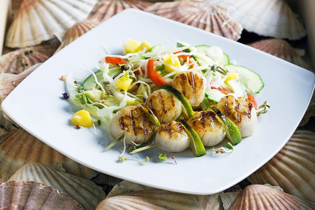 Grilled scallops on a vegetable and mango salad