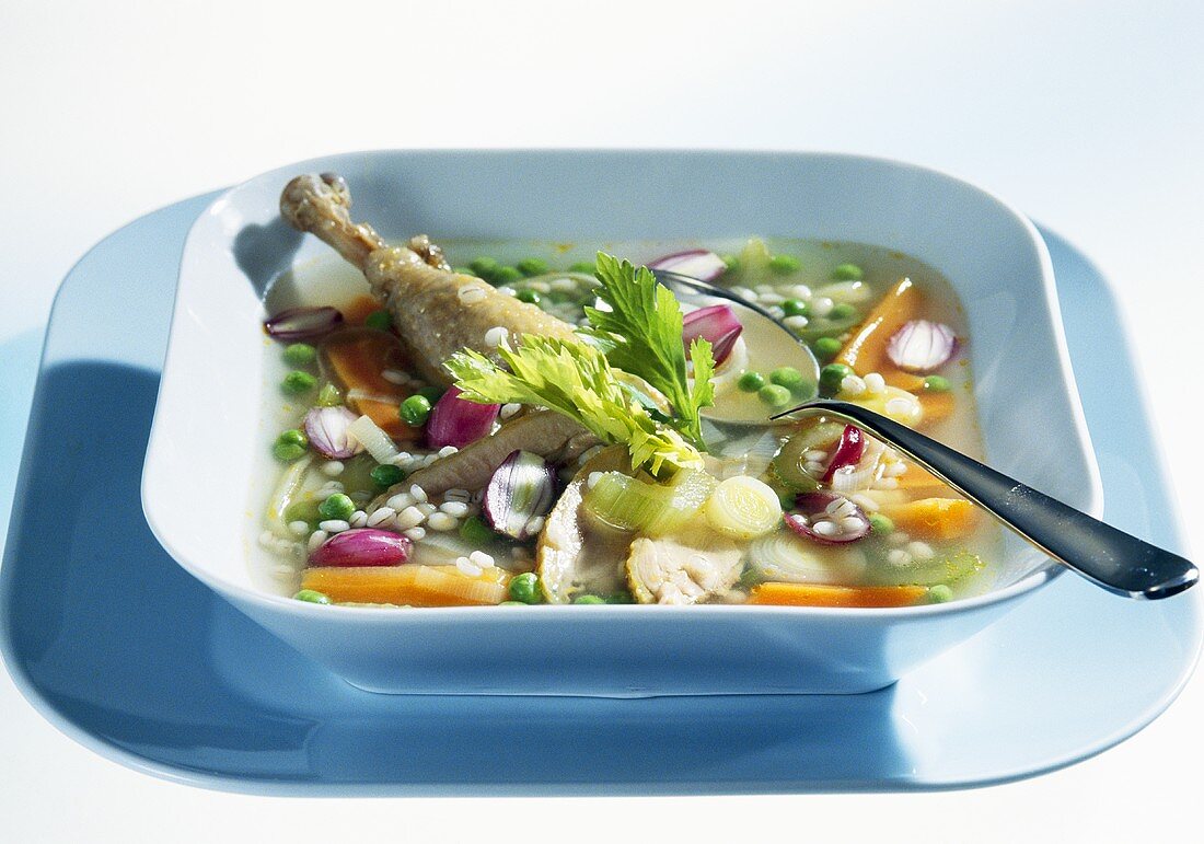 Guinea fowl soup with barley and vegetables