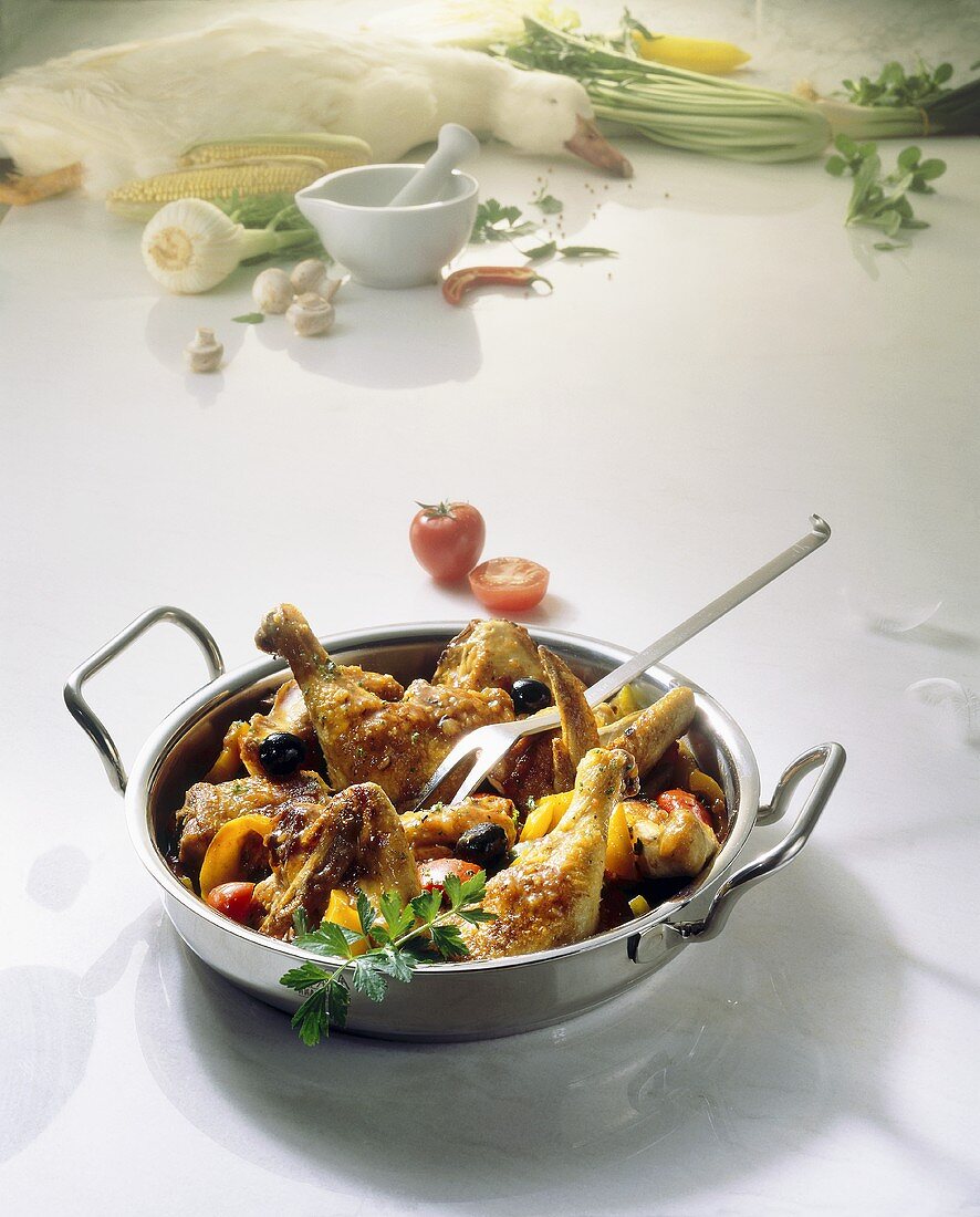 Pollo alla cacciatora (chicken with vegetables and olives, Italy)