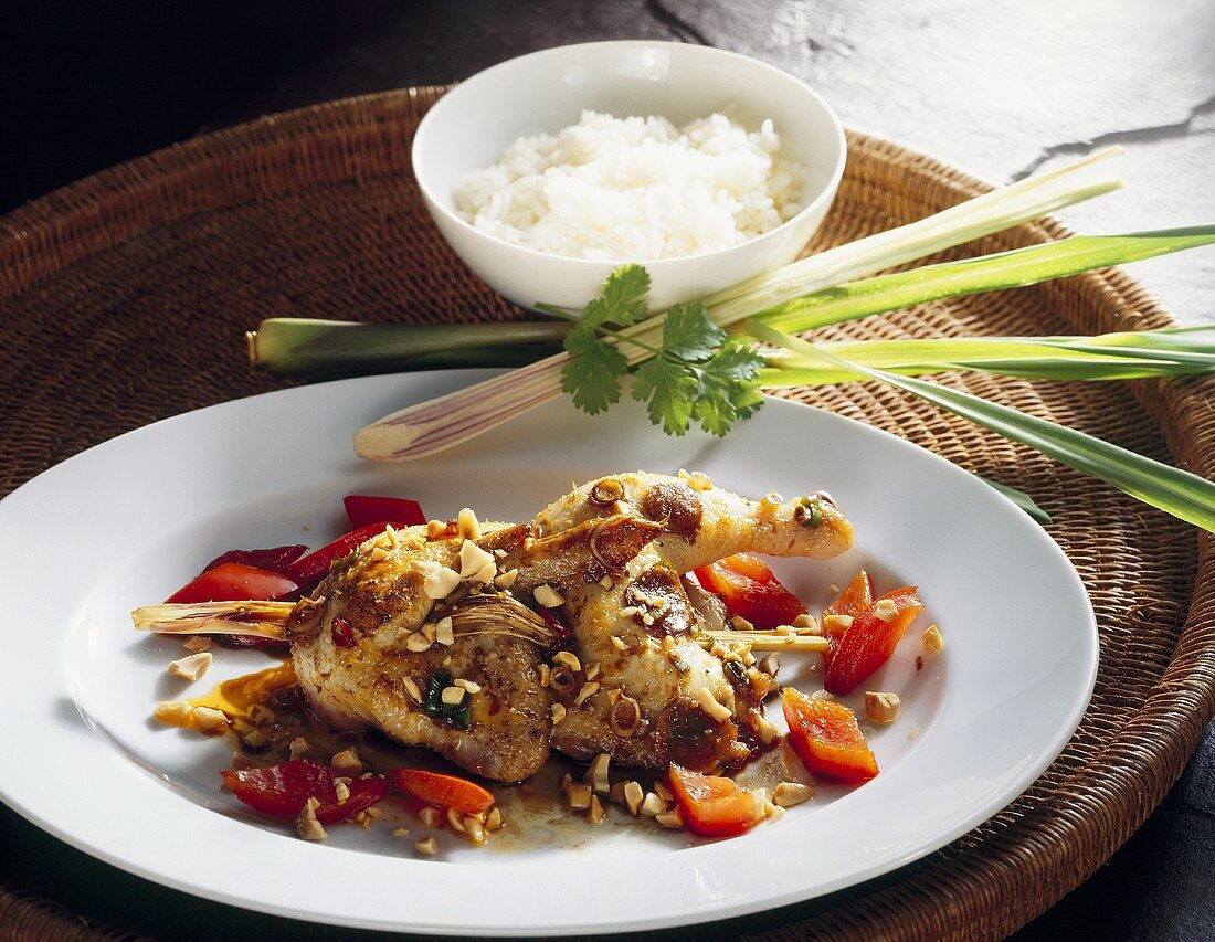 Peanut chicken with pepper, lemon grass and rice