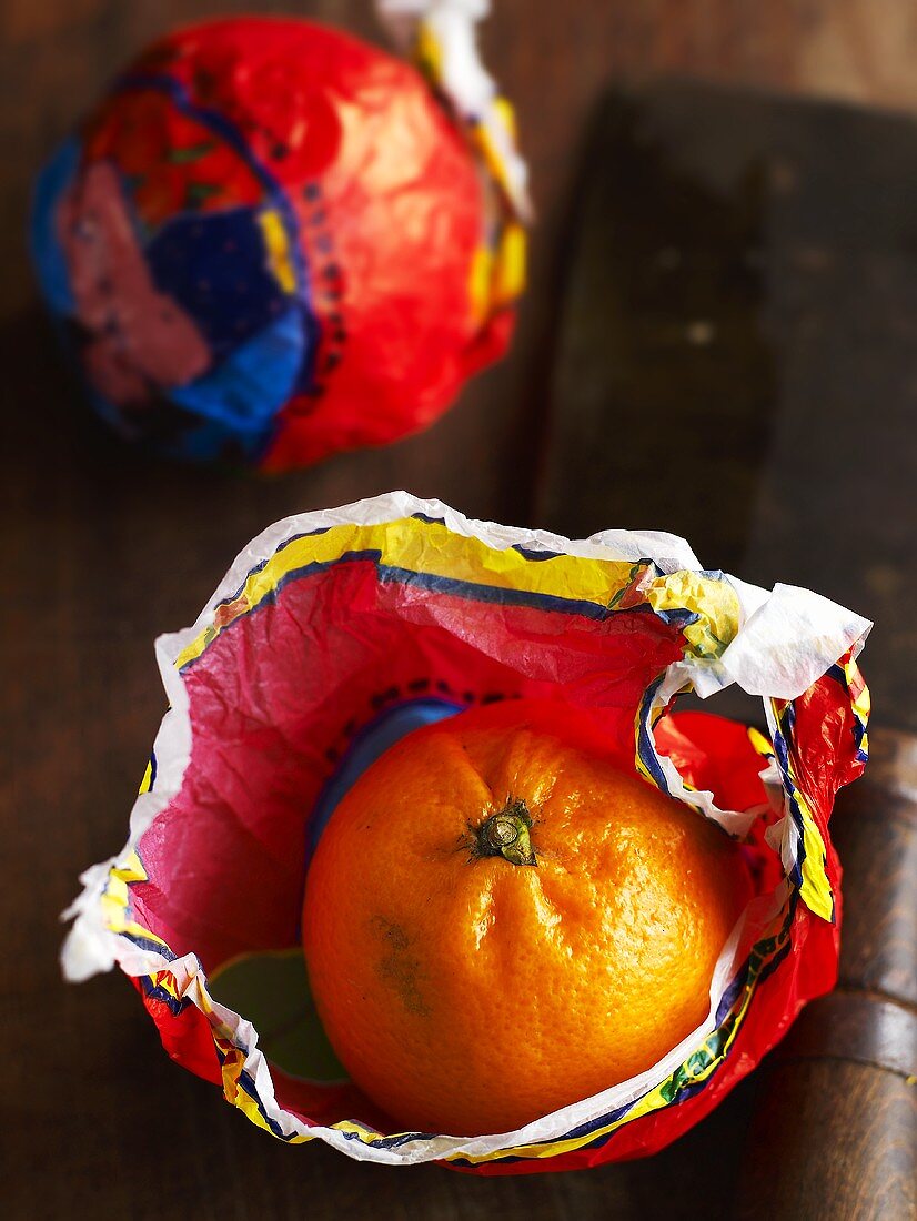 Blood oranges with wrapping paper