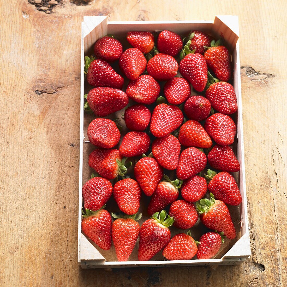 A box of fresh strawberries