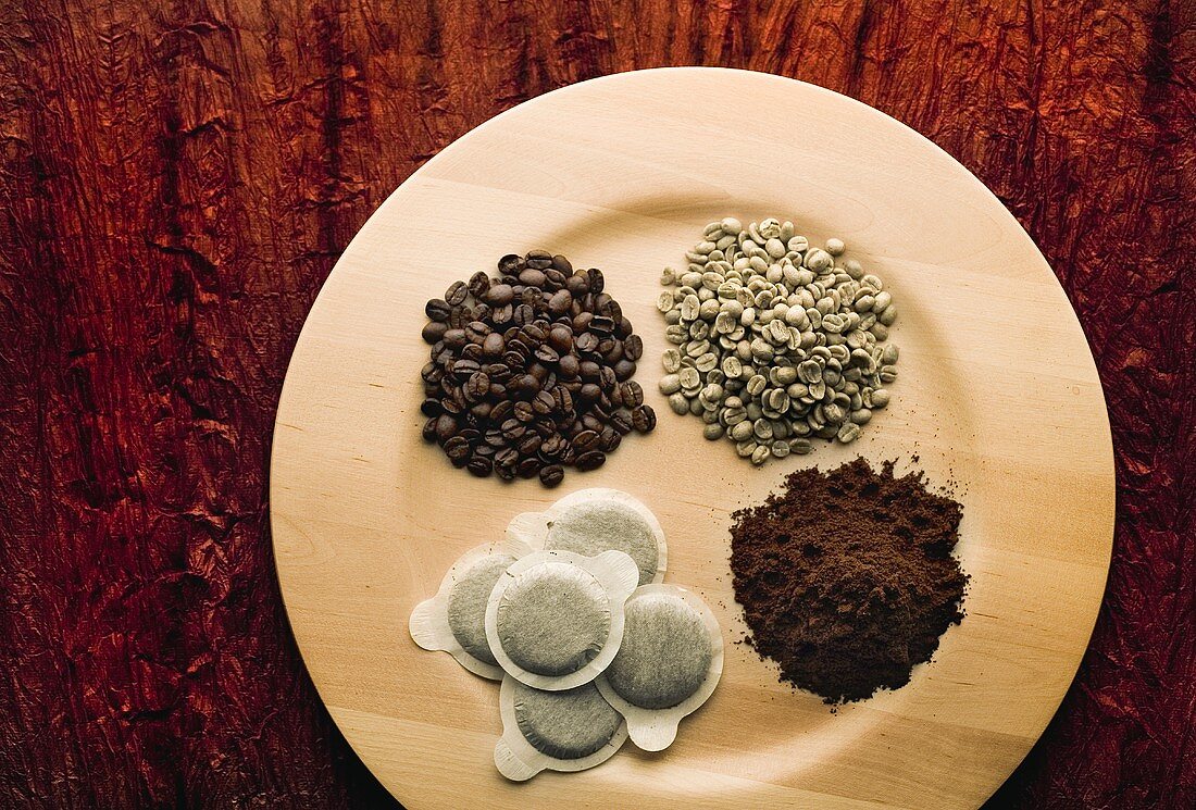 Coffee beans, roasted, raw and ground with coffee pads