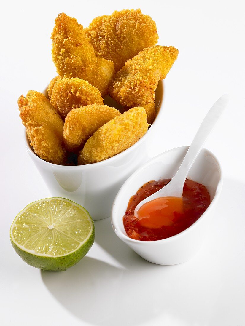 Chicken nuggets with chilli dip and lime