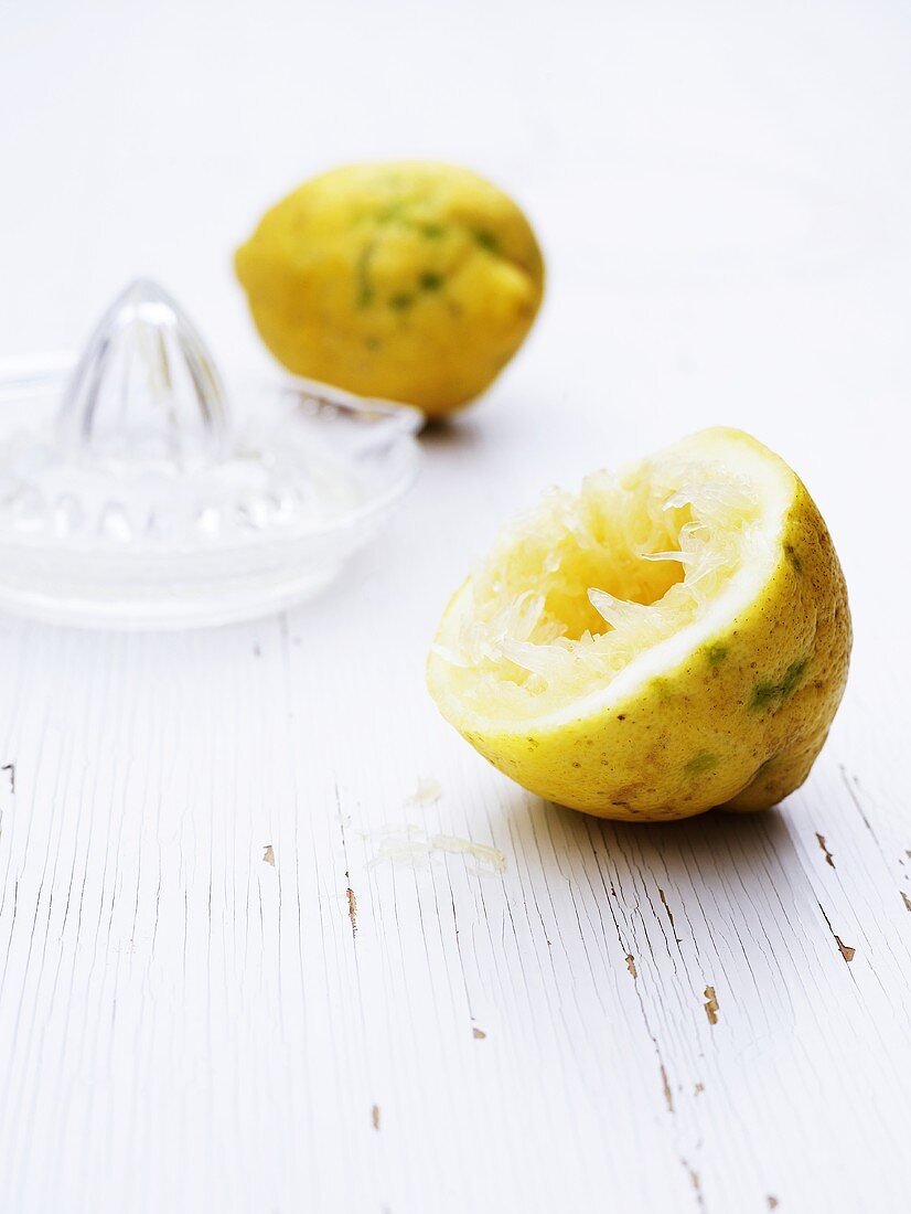 Lemon and a lemon juicer