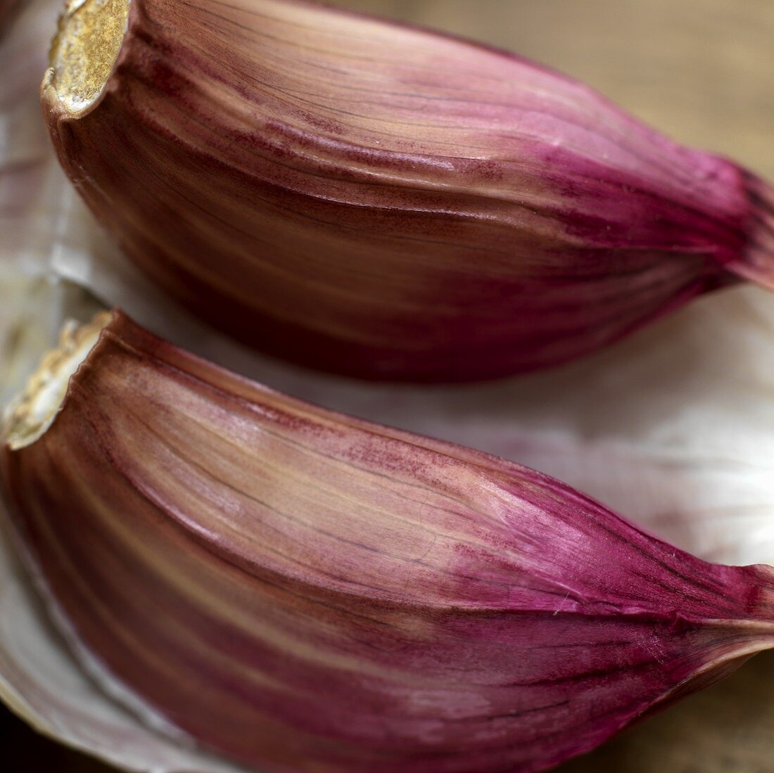 Two unpeeled cloves of garlic