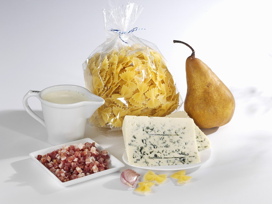 Ingredients for farfalle with cheese and bacon sauce and pears