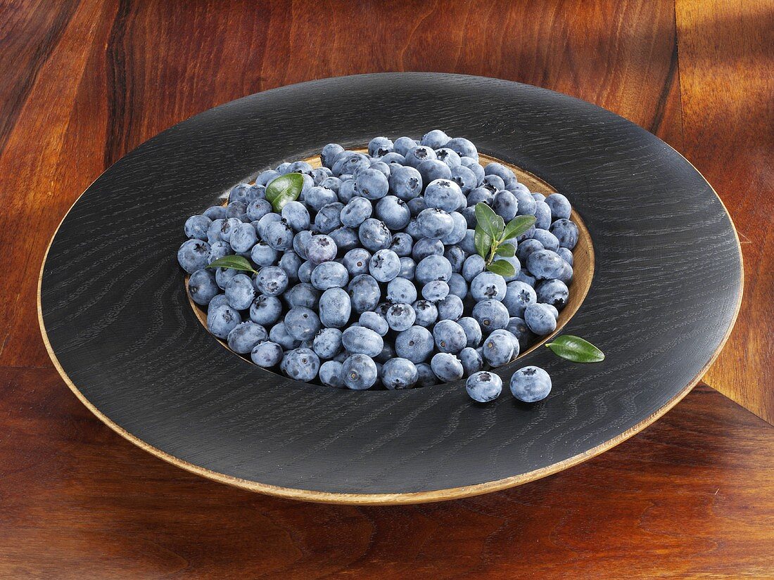 Blueberries in a wooden dish