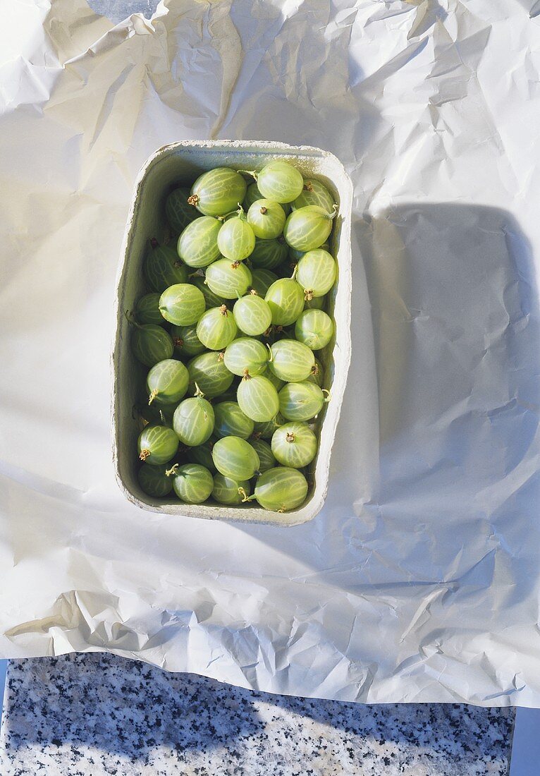 Gooseberries in a cardboard punnet