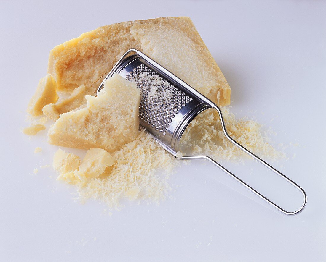 Parmesan cheese with grater