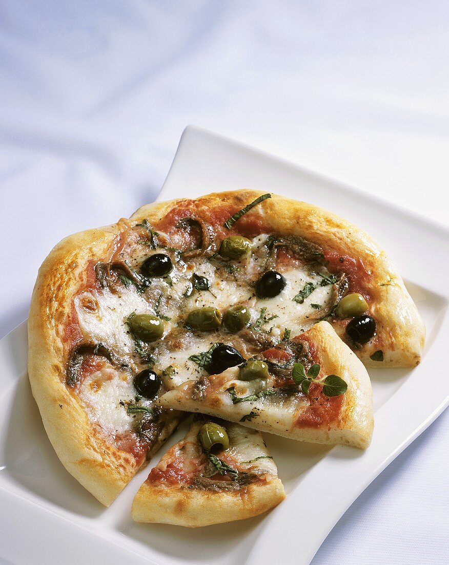 Pizza with anchovies and olives