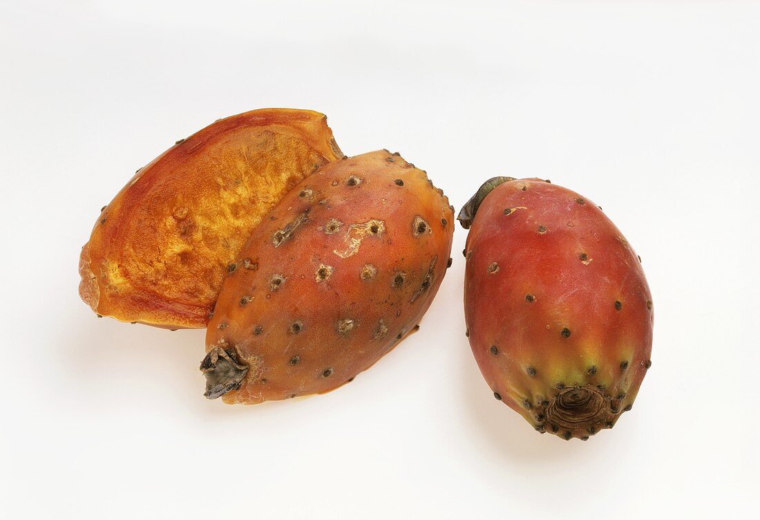 Whole and halved prickly pears