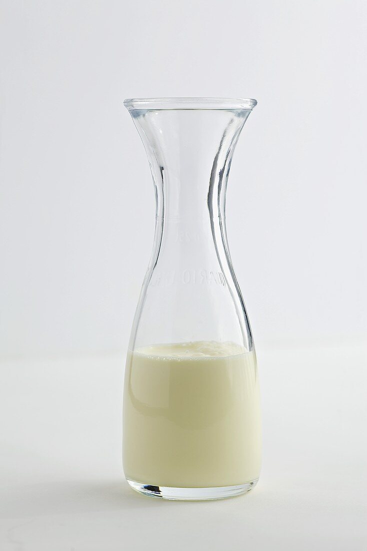 Milk in a glass carafe