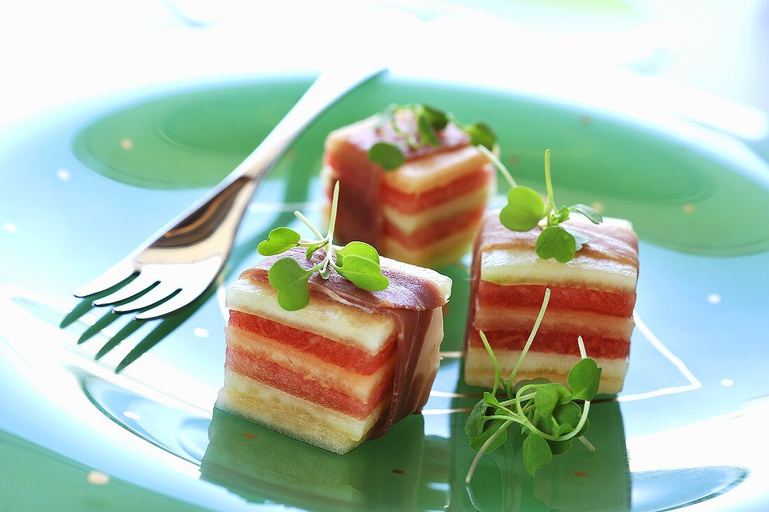 Melon cubes with serrano ham