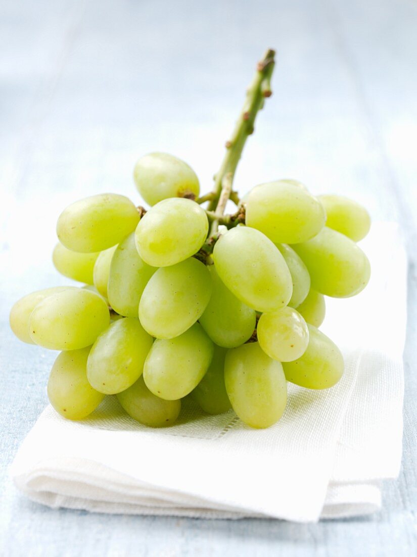 Green grapes on napkin