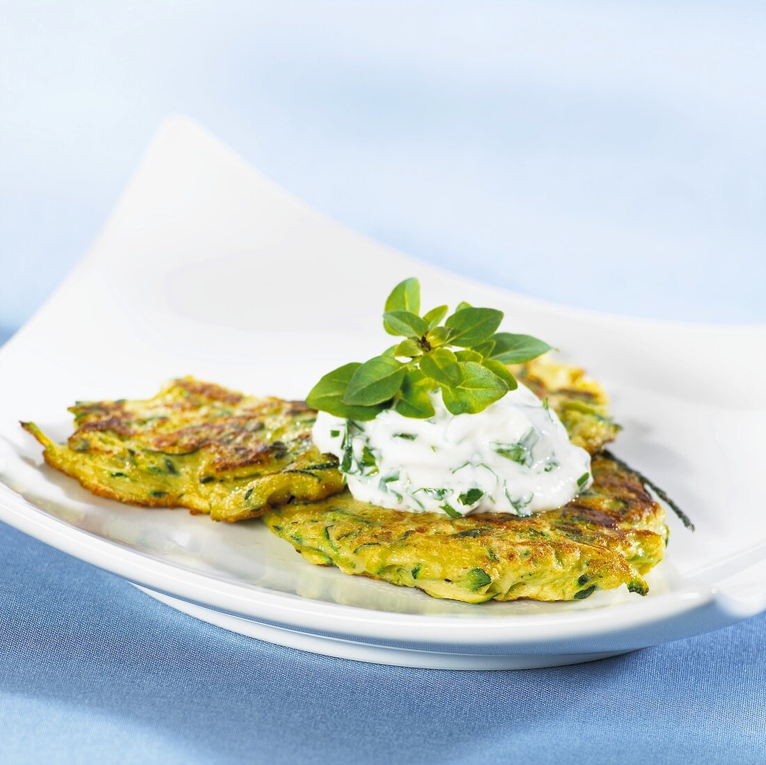 Courgette pancakes with soft cheese